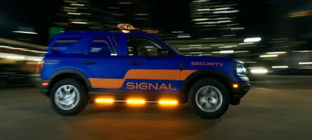 Signal Security mobile unit patrolling a parking facility