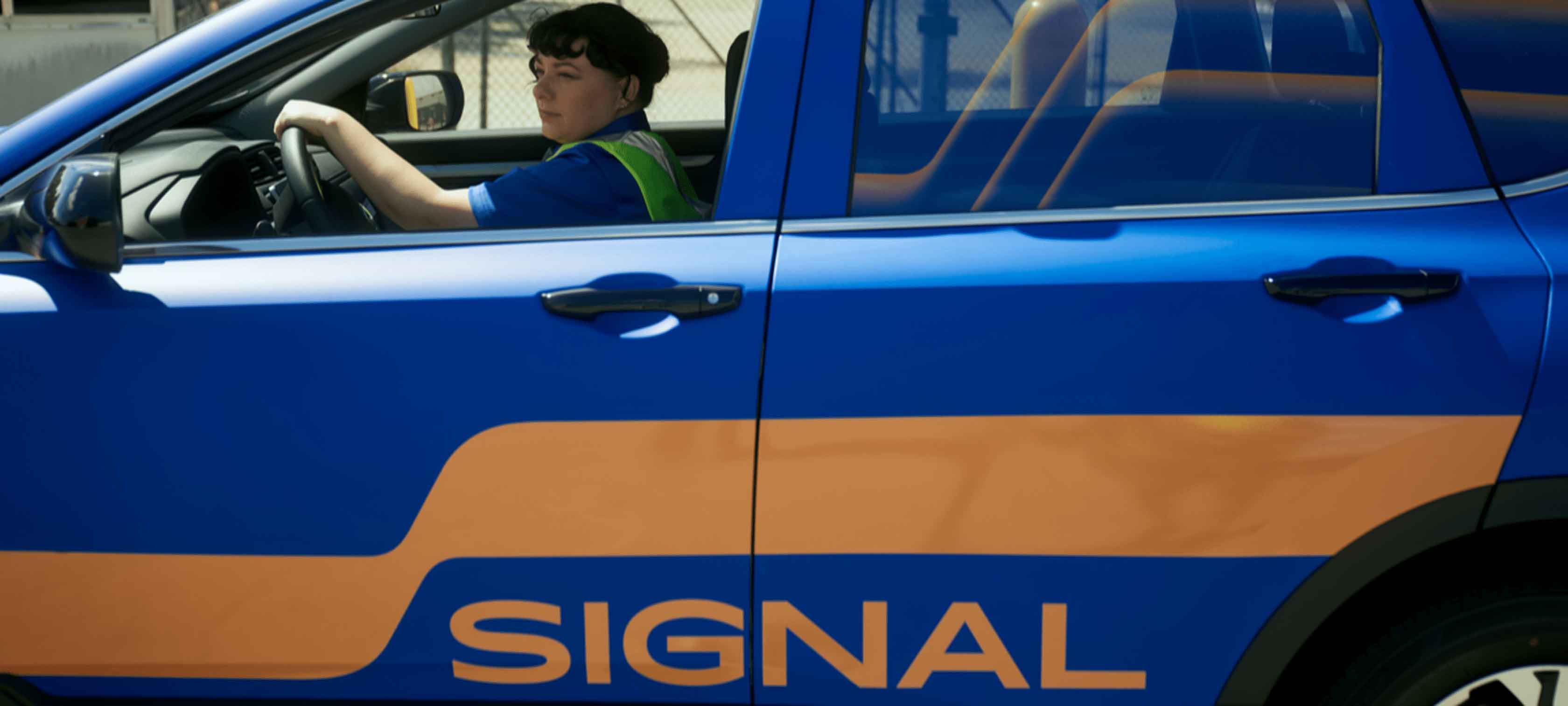 Signal employee driving company vehicle