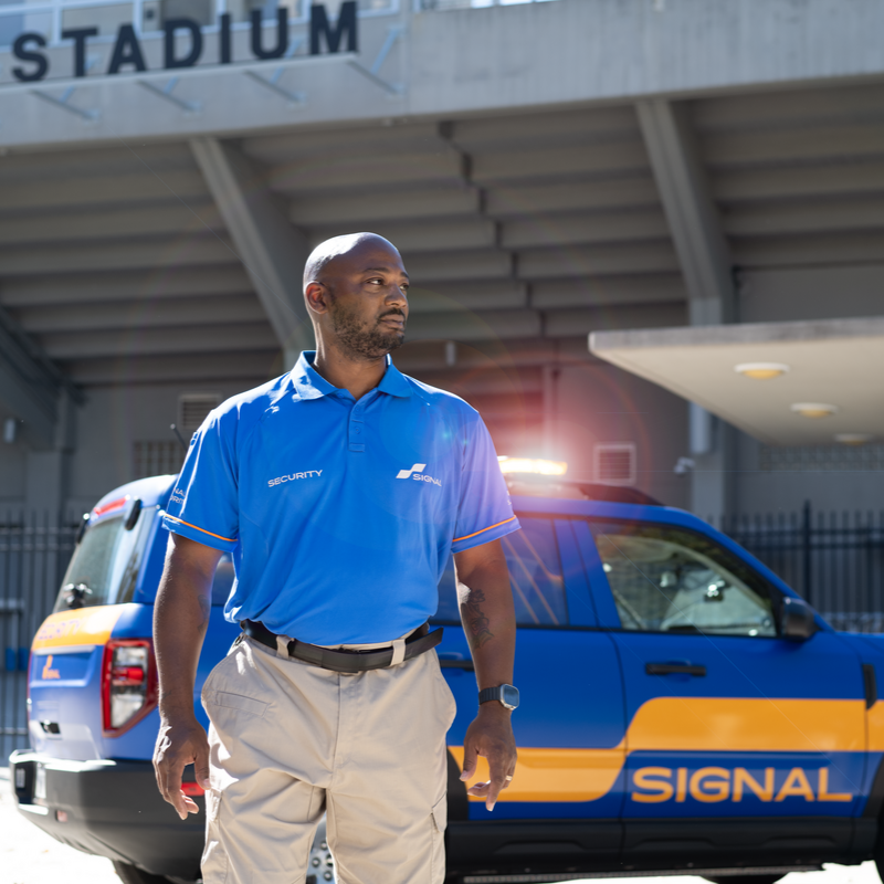 Signal officer with patrol car. 