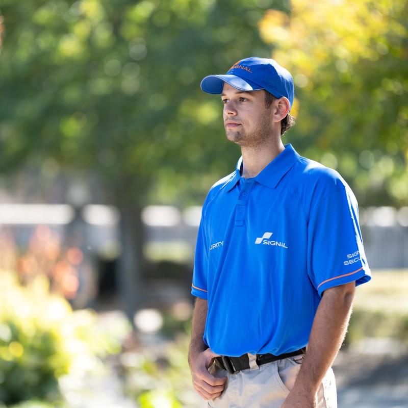 Signal officer in blue polo. 